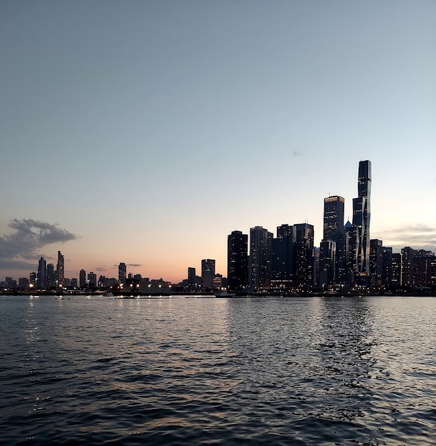 downtown chi at dusk over lake michigan