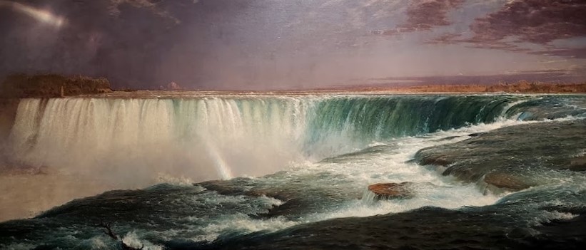 painting of niagra falls in a golden frame