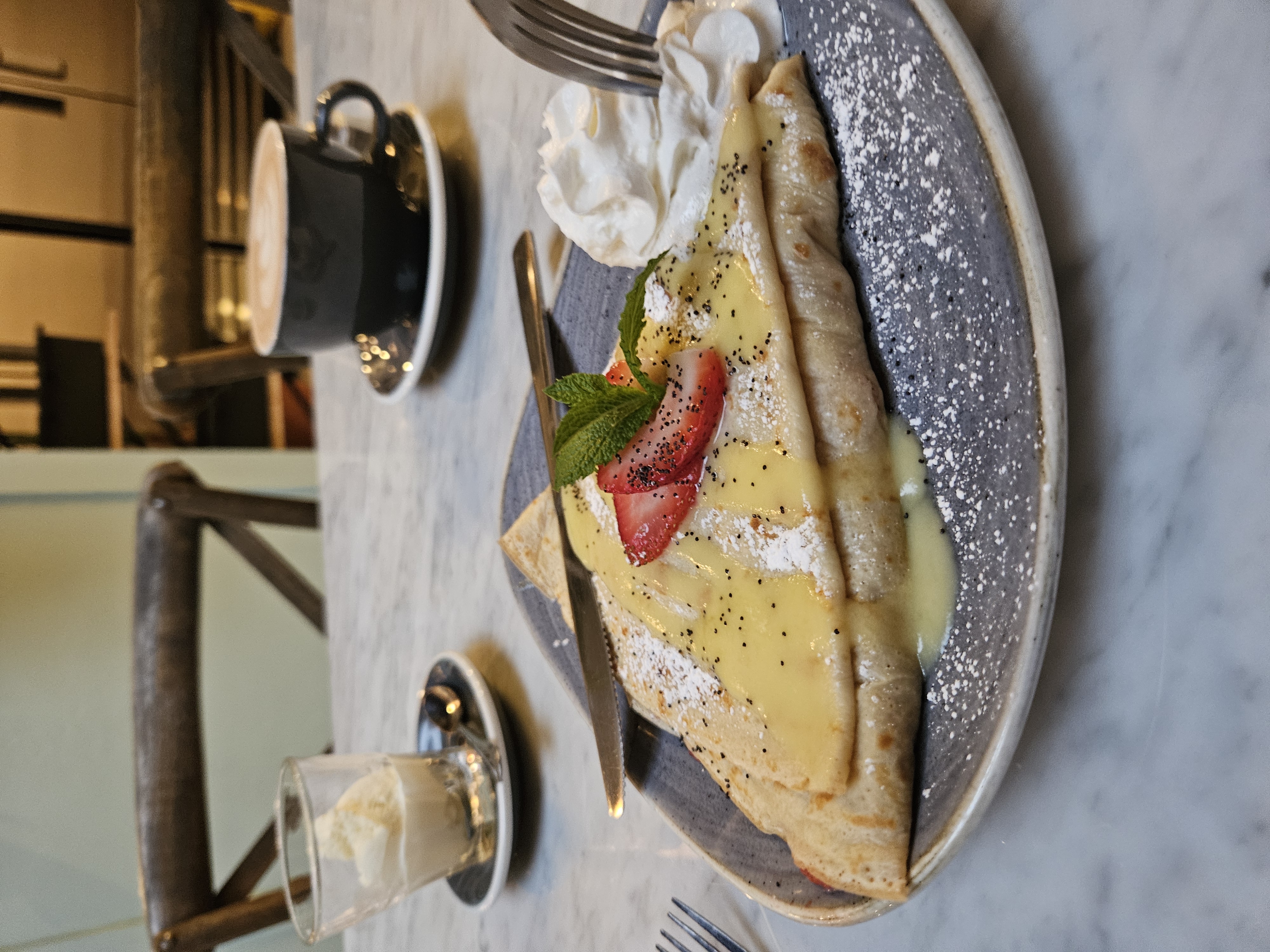 lemon strawberry crepe with whipped cream