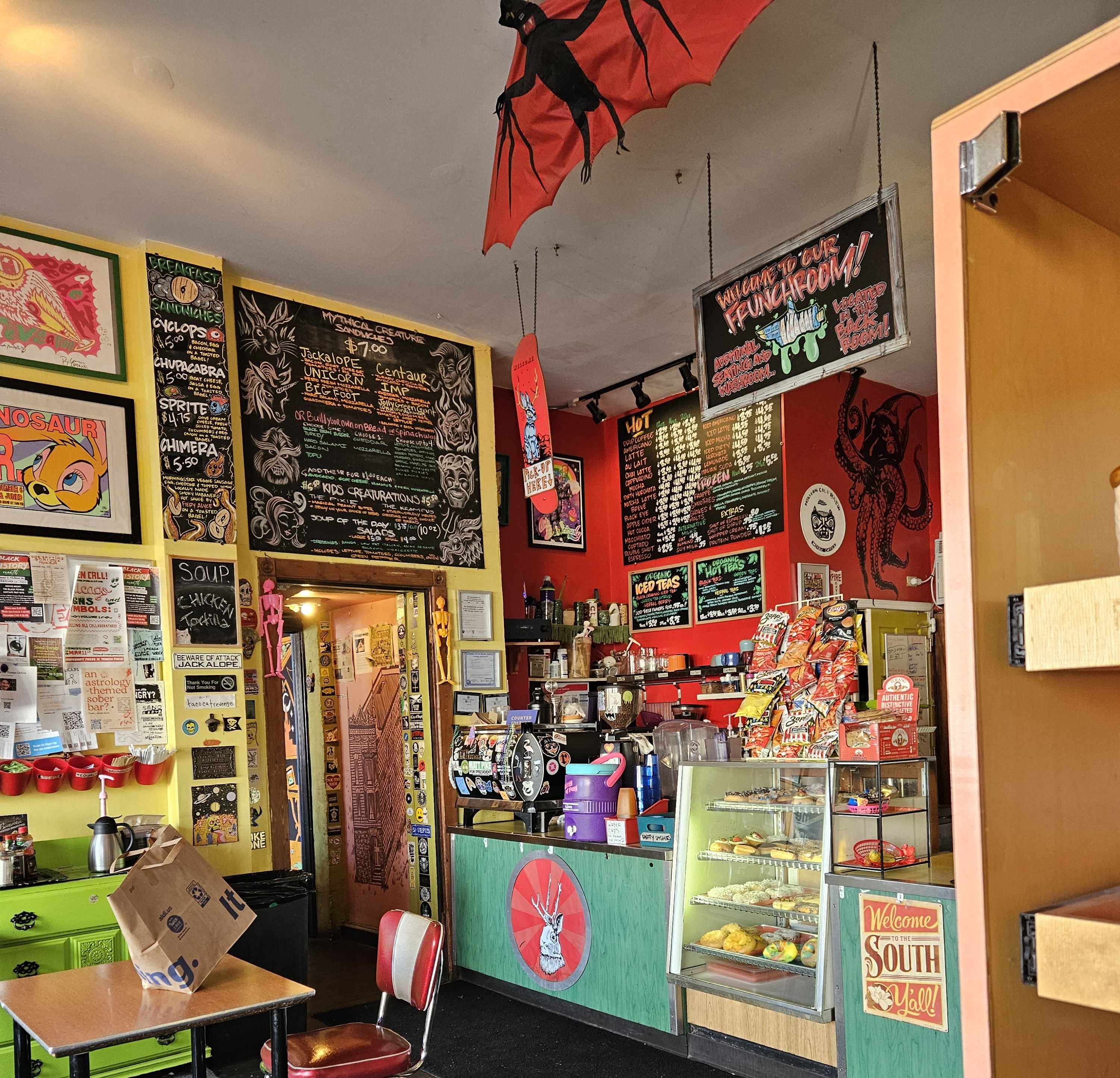 colorful cafe front with halloween art