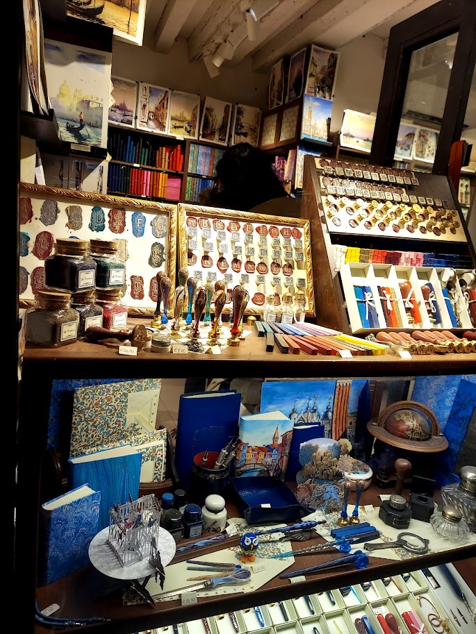 window display of wax seals and glass pens