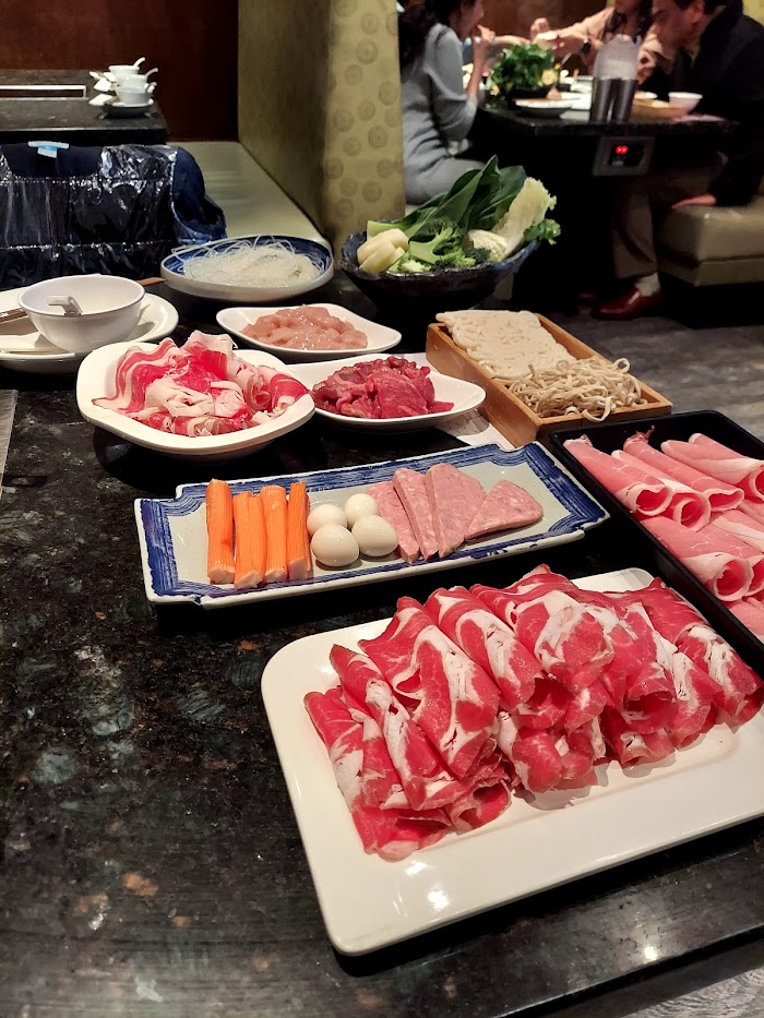 collection of uncooked meats and noodles