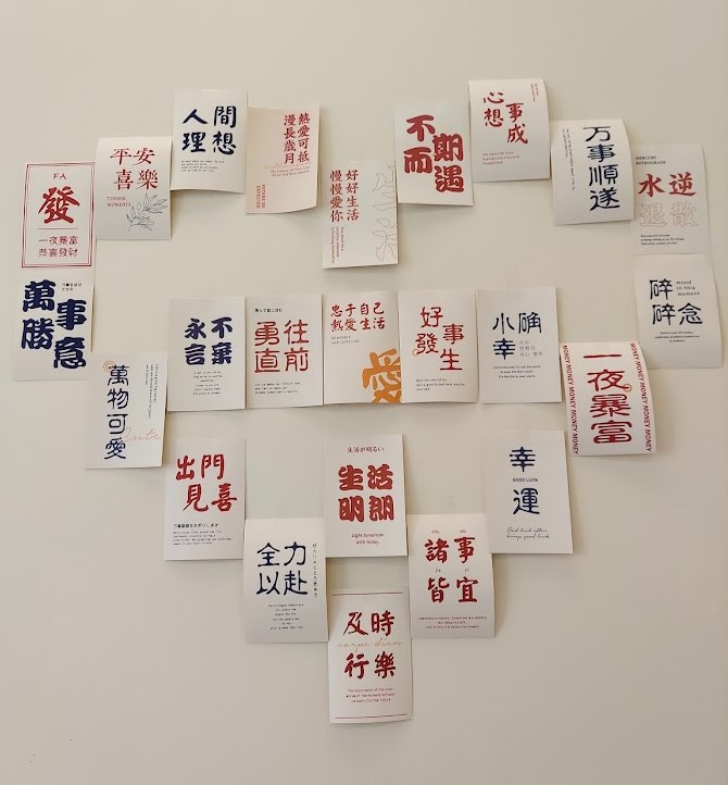 paper cards with chinese in the form of a heart