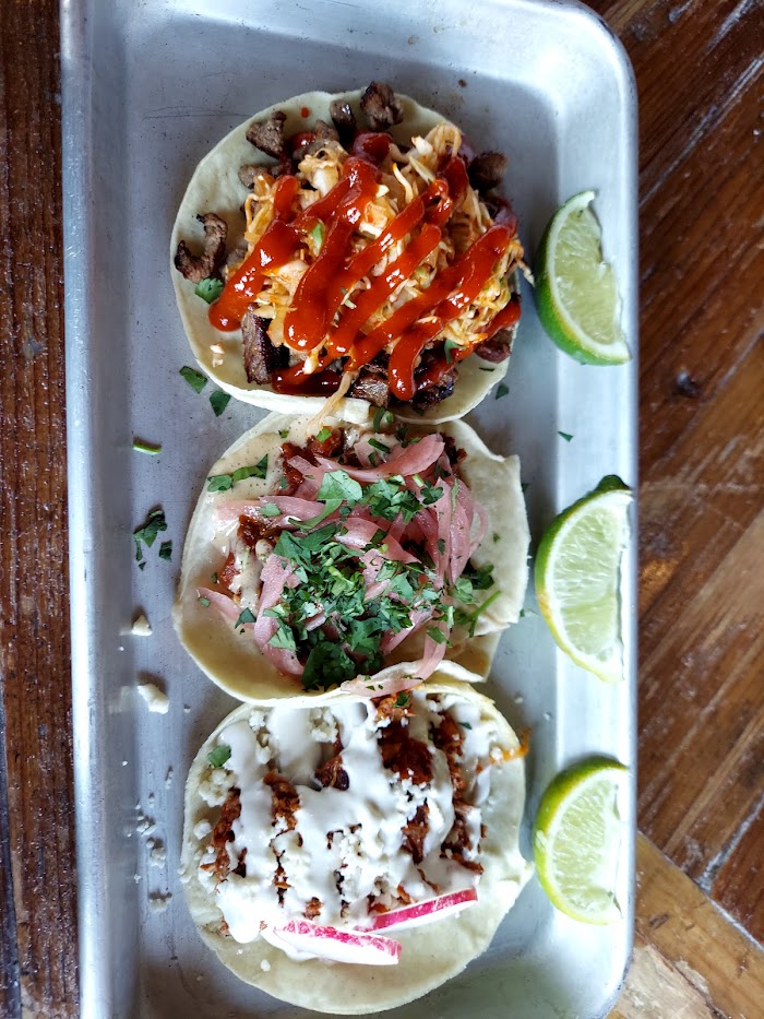 three street tacos with lime