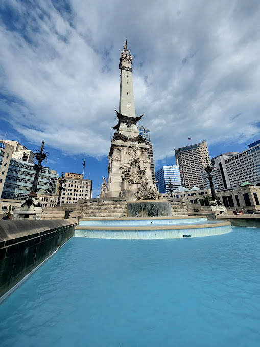 stone statue with blue water