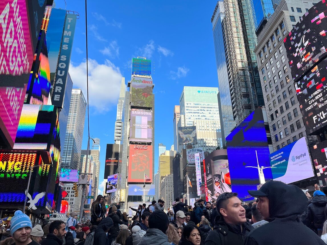 times square with flashing billboards