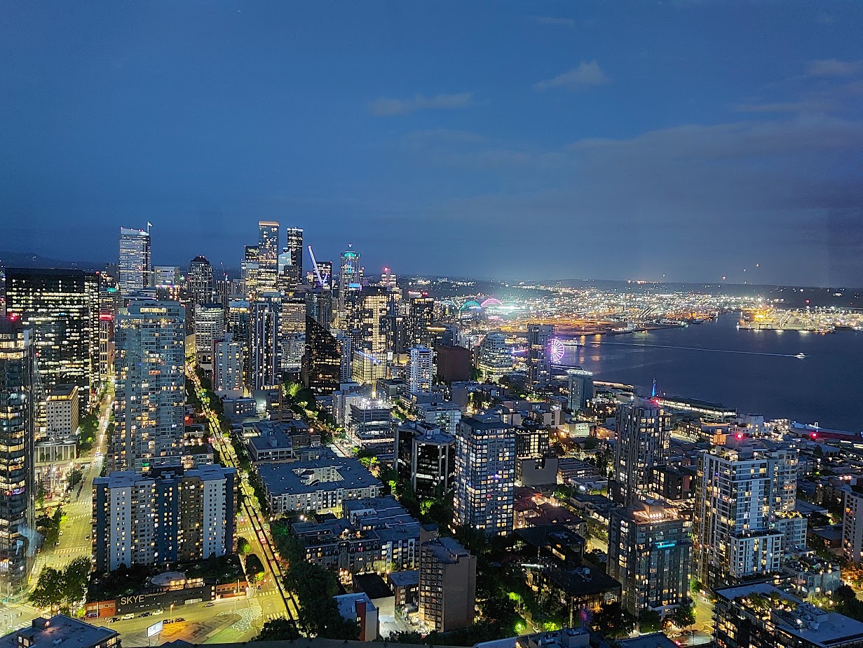 view of downtown seattle at night from space needle