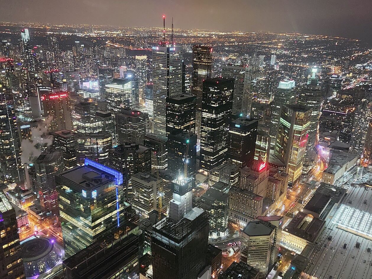 city lights at night from the top of the cn tower