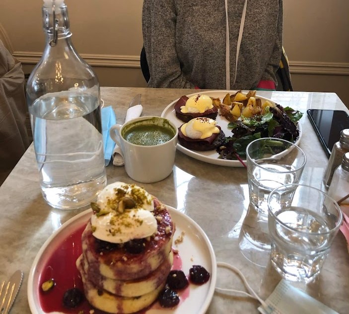 pancakes, matcha, and eggs benedict